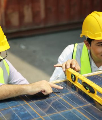 two-engineers-installing-solar-cell-at-site-2021-11-03-16-05-48-utc.jpg